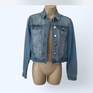 Blue denim jacket with button front closure, long sleeves, and a relaxed fit